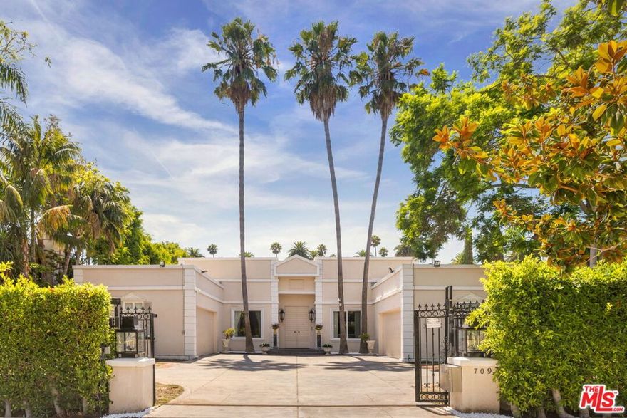 Welcome to 709 N Camden Drive, an exceptional offering on one of the most coveted streets in the 700 block of the Beverly Hills Flats. Set on an expansive and gated 14,893 square foot lot, this property presents a rare opportunity to reimagine the existing residence and lot in one of the most prestigious neighborhoods. The current estate features five spacious bedrooms and five bathrooms, providing generous living space. The expansive backyard includes a sparkling pool with ample room for outdoor entertaining, lounging, or creating a custom designed retreat. Surrounded by iconic Beverly Hills estates, this property combines location, lot size, and potential, making it a truly special opportunity in the heart of the Flats.