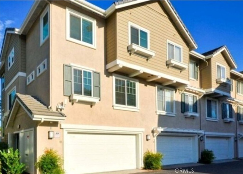 Beautiful gem in the highly desirable Lakeside Gated Community in Buena Park features 3 Bedrooms, 2.5 Bathrooms with attached two car garage. Open floor plan with tiled entry, Newer SPC wood flooring with all bedrooms. Walking to Buena Park train Metro link Station. Enjoy all the amenities of the community which includes access to community pool , club house, fishing, basketball court, hiking and playground.
