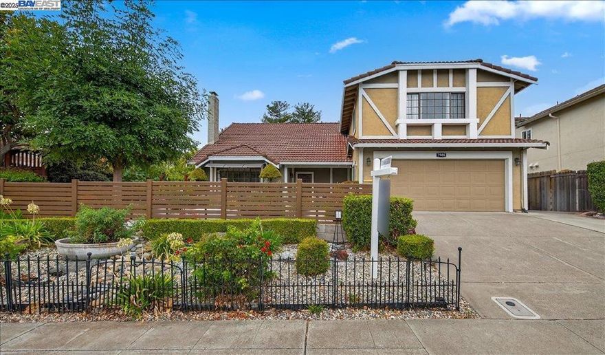 Beautifully situated in the desirable West Dublin Hills, this East facing 4-bedroom home is conveniently located with close proximity to 580/680 freeways, BART, top-rated schools, shopping, and dining. Boasting great curb appeal, the charming front yard garden welcomes you inside. The inviting living room features vaulted ceilings, a picture window, and a cozy fireplace, flowing into the formal dining room. The updated kitchen includes granite countertops, newer appliances, and a spacious pantry, with luxury vinyl floors throughout the main level. Upstairs you’ll find four bedrooms plus a versatile loft, all with bamboo laminate flooring. The expansive primary suite includes a walk-in closet and dual vanities. Step outside to your private backyard filled with mature fruit trees—Asian pear, lemon, persimmon, plum, and grapefruit—plus lush landscaping and a storage shed. A rare opportunity to own a home that checks all the boxes for this price!