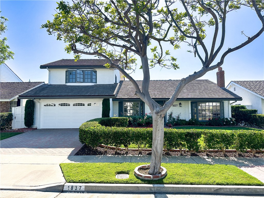 Prime Location! This beautifully updated 4-bedroom plus bonus room home is perfectly situated in the Port Streets of Newport Beach, just a short stroll from the charming greenbelt. It’s centrally located, two blocks from the highly regarded Andersen Elementary School, the community clubhouse, and the resort-style community pool, which is heated year-round and home to the popular community swim team.
Upon entering, you’ll be greeted by a welcoming living room featuring a cozy fireplace and vaulted ceilings, seamlessly flowing into the dining area—ideal for family gatherings and entertaining guests. The kitchen boasts a bright, open layout, connected to the family room and overlooking a spacious green backyard with a patio. It has been fully updated with white shaker cabinetry, gray stone countertops, and stainless-steel appliances, including a 6-burner stove.
The primary suite, located on the main level, offers vaulted ceilings and an ensuite bathroom. Also on the main level are two additional bedrooms and a recently updated full bathroom. Upstairs, you'll find a large bonus room—perfect for extra living space or a playroom—along with a full bathroom and the fourth bedroom, completing this turnkey home.
Harbor View Homes, also known as the Port Streets, offers convenient access to world-class beaches, Fashion Island shopping, the 73 highway, and John Wayne Airport.