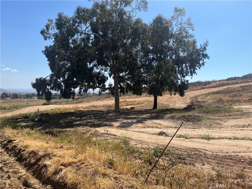 Perfect Location in Moreno Valley! Discover the perfect opportunity to build your dream home or investment property on this spacious 2.5-acre lot, ideally situated. Conveniently located just 1 mile from the 60 Freeway, this property offers easy access for commuters while providing a peaceful retreat from the city. Key Features: ? Ready to Build – Water, electricity, are available for connection. Call Gas co for service Prime Location – Close to shopping centers, schools, hospitals, and everyday amenities. ? Easy Access – Situated close to the main road for seamless entry. ? Tranquil Setting – Enjoy the quiet solitude of expansive land while staying connected to urban conveniences. Whether you’re looking to develop, invest, or create a private sanctuary, this versatile and well-located parcel of land is a rare find. Don’t miss out on this incredible opportunity! One of the lowest property tax locations you will find.