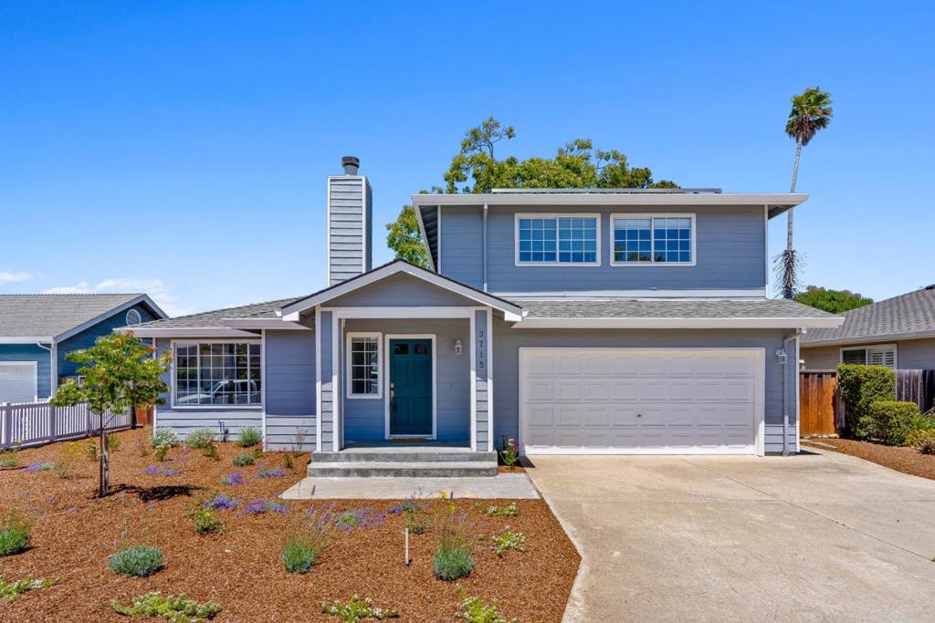 Just Steps from Pleasure Point. Nestled on a quiet cul-de-sac, this home offers the perfect blend of tranquility and convenience. Just a stone's throw from Pleasure Point, you'll have access to parks, local shops, coffee spots, restaurants, and, of course, the stunning ocean all within walking distance. The home has been freshly painted in and out and features an open and airy living room with a cozy wood-burning fireplace. The bright and inviting kitchen flows seamlessly into a dining area, perfect for family meals or entertaining guests. The primary retreat is located on the ground floor, offering easy access to the serene backyard, with space to have your own garden and an expansive deck, complete with a relaxing hot tub ideal for unwinding after a long day. Upstairs, you'll find two spacious bedrooms sharing a bathroom. Additional highlights include solar power, which keeps energy costs down, and a location that's a true gem just minutes from everything you love about Pleasure Point. Whether you're looking for your forever home or a weekend getaway, this charming property has it all.
