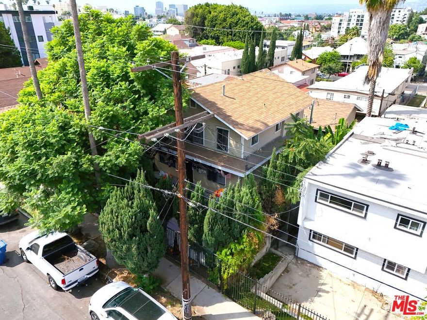 We are pleased to present a five (5) unit apartment building located at 251 N Burlington Avenue in Los Angeles, California. The subject property is located in a solid Echo Park location, north of Beverly Boulevard and east of Alvarado Street. This well-located Echo Park multifamily property offers a rare investment opportunity with substantial upside. The property is hitting the market for the first time in over 30 years. The building features a streamlined unit mix of all two-bedroom units. Gated and secure with full on-site parking in the rear, the lot also boasts lush front yard landscaping and strong curb appeal. The rear parking area presents excellent potential for ADU development under SB1211, supported by convenient alley access. Surrounded by ongoing and completed developments, the property is also just steps from major commercial corridors like Beverly Blvd, Temple St, and Alvarado St, placing it in a high-demand, rapidly evolving neighborhood. With its solid location, over 70% rental upside, and strong potential for added value through ADU development, this property offers a rare opportunity for investors to capitalize on one of LA's most dynamic and fast-growing rental markets.