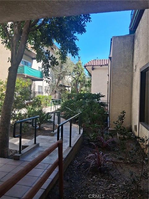 Photo of 5640 WHITE OAK Avenue #C216, Encino, CA 91316 (MLS # CV26217778)