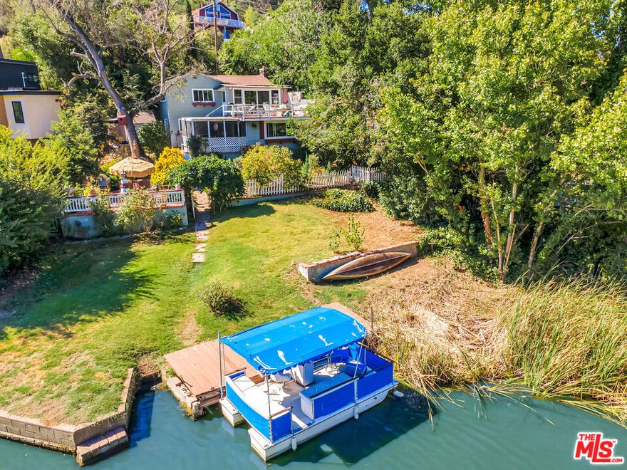 LOCATION, LOCATION!  JEWEL IN THE ROUGH!  4 Bedroom Lakefront home at Malibou Lake!  New Listing featuring a Unique Private Setting with much room for Future Improvements!  Includes private lake with community pool, tennis and club house!  Like living in a resort amid a pristine park with miles of hiking and riding trails! Centrally located minutes to shopping, schools, freeway and the Malibu Beaches!