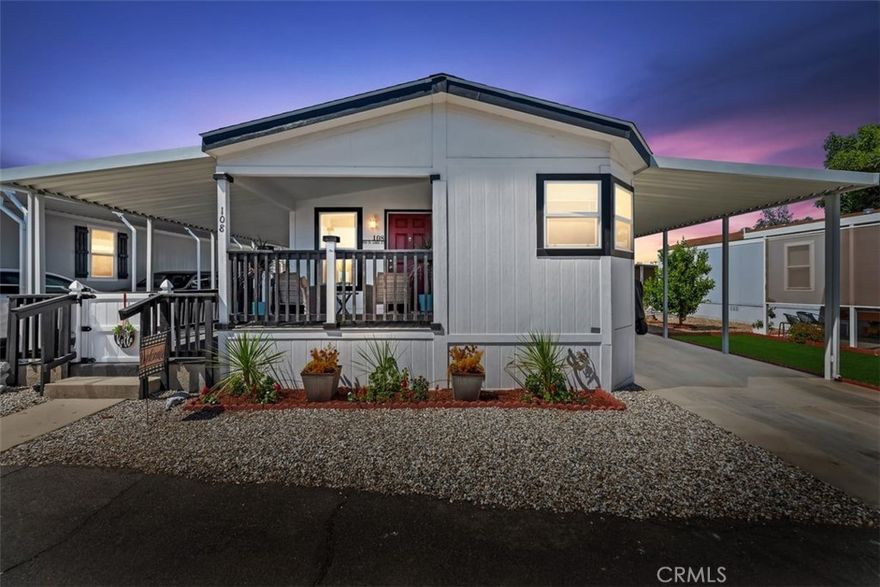 PRICE IMPROVEMENT. SELLER IS EAGER FOR A QUICK SALE!  FARMHOUSE CHIC WITH ALL THE BELLS AND WHISTLES! BEAUTIFUL 2022 HOME WITH 2 BEDROOMS AND A LARGE BONUS ROOM WHICH CAN BE USED AS A DEN/OFFICE OR BEDROOM (NO CLOSET). THE HOME HAS LUXURY VINYL PLANK FLOORING AND NEW FIXTURES. BEDROOMS INCLUDE CEILING FANS AND CARPET. THE NATURAL LIGHT FILLED MASTER BEDROOM HAS AN EN SUITE WITH A DOUBLE SINK VANITY, WALK-IN SHOWER AND LARGE WALK-IN CLOSET.   THE UPGRADED KITCHEN HAS UNDERLIT CABINETS, LARGE BLACK ONYX FARMHOUSE SINK, PANTRY WITH ETCHED GLASS DOOR, STAINLESS STEEL APPLIANCES AND RECESSED LIGHTS. SPECTACULAR SCENIC MOUNTAIN VIEWS CAN BE SEEN FROM THE KITCHEN WINDOWS. A LARGE INSIDE LAUNDRY ROOM WITH LIKE NEW WASHER AND DRYER ARE INCLUDED. BARN DOORS ARE ALSO FEATURED IN THE HALL BATH AND GUEST BEDROOM. THE EXTERIOR OF THE HOME HAS A COVERED FRONT PORCH AND A SIDE COVERED CONCRETE DECK FOR ENJOYING SUMMER EVENINGS IN YOUR ROCKING CHAIR. A LARGE SHED FOR STORAGE AND AN ENCLOSED AREA PERFECT FOR PETS IS ALSO ON THE PROPERTY.  THE PARK'S AMENITIES INCLUDE POOL, SPA, FITNESS ROOM, BILLIARD ROOM AND CLUBHOUSE. THIS IS A SAFE AND FRIENDLY GATED COMMUNITY NEAR SHOPS, RESTAURANTS AND CASINO.