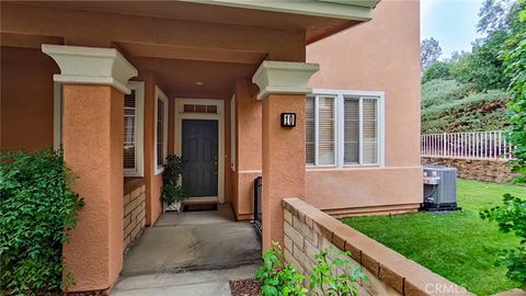 Photo of 27903 Baneberry Pl #10, Valencia, CA 91354 (MLS # GD25263245)