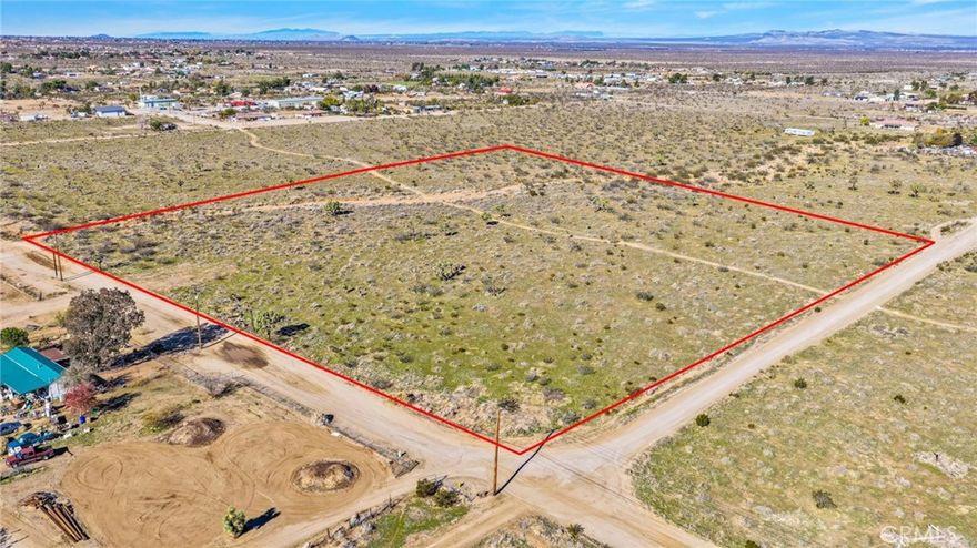 10 acres of land to build your custom home or multiple family compound.  Property can be split into 4 additional lots to custom build spec homes.  Check with County of San Bernardino as zoning shows possible 1 acre minimum lot size.  Surrounded by custom homes and located in the Snowline School District. This property falls within the County of San Bernardino just on the border of City limits of Victorville.  Owner is willing to carry note so bring your best offer and start building!