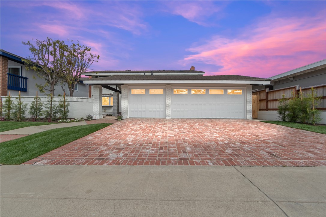 Uncover coastal charm in this exquisitely renovated contemporary-style home! This beautifully remodeled 4-bedroom, 2.5-bathroom property is located in the highly desirable neighborhood of Upper Seacliff and features modern upgrades, a large south-facing lot that invites natural light throughout the day, and a versatile floorplan designed for today’s lifestyle. As you enter through a private courtyard, you will discover a home that has been meticulously updated with exceptional attention to detail. The home boasts stunning white oak hardwood floors throughout, complemented by elegant baseboards and crown molding. New windows, sliding doors, and interior solid core doors elevate the design, while the brand new HVAC system ensures year- round comfort. Energy-efficient recessed LED lighting and fresh interior and exterior paint contribute to the home’s crisp, modern feel. The remodeled kitchen offers a scenic view of the backyard and features new shaker cabinets, pullout pantry drawers and sleek quartz countertops. Redesigned fireplaces add warmth and character to the family room and primary bedroom, while an upgraded 200-amp electrical panel provides peace of mind. The bathrooms have been completely updated with new quartz countertops, tiled flooring, cabinetry, showers, bathtubs, sinks, and toilets. The master suite has been meticulously redesigned to create a serene personal retreat that includes high ceilings, his and her walk-in closets, a gorgeous tile walk-in shower, modern quartz countertops, a dual vanity and a skylight that warms up the space with natural light. The downstairs area has been reimagined to enhance flow, creating the perfect space for both relaxation and entertaining. The huge backyard has been freshly landscaped to provide the ideal outdoor space. All of this just a short walk from Seacliff Elementary School, Discovery Park, and the HB Urban Forest, with a quick bike ride to the world famous HB beaches, downtown HB, Pacific City, and The Huntington Club!
