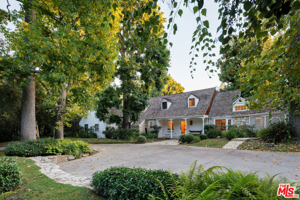 Prime Beverly Hills Flats Traditional Estate on 27,000sqft+ lot. East end of BH Flats, walkable to finest restaurants and shopping. Complete privacy with gated motor court for approx. 15 cars. Charming compound - major grounds with mature trees and large grassy yard. Causal floor plan with public rooms opening via French doors to gardens beyond. Main level primary suite with fireplace/sitting room, dual baths and large walk-in closets. 3 additional bedrooms. Epic guest house with large gym and full bedroom/bath. Additional features include a 3-car attached garage and extra parking area accessible from alley. Incredible opportunity to own a most charming and central Beverly Hills property. Shown only to prequalified buyers.