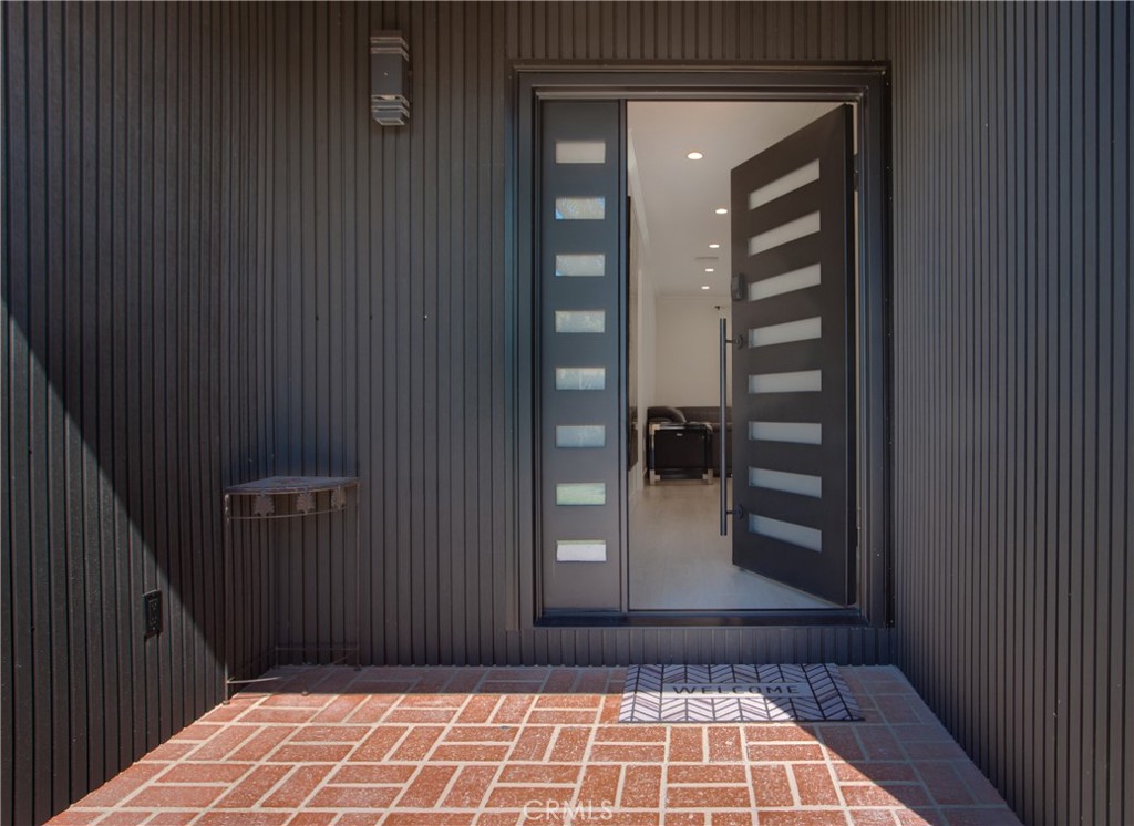Located on a peaceful cul-de-sac, behind a beautiful gated entrance, this thoughtfully upgraded 3 bed, 2 bath smart home sits on a rare 10,546 sq ft lot in Van Nuys. Designed with attention to detail and long-term quality in mind, the home combines modern smart technology, energy efficiency, and a spacious outdoor layout.
Features include app-controlled smart lighting throughout, keypad entry door, smart garage opener, Doorbird video intercom at the front gate, and a full Ring security system with motion-activated floodlight cameras around the perimeter.
The kitchen shines with KitchenAid stainless steel appliances and quartz countertops, creating a modern and functional space for cooking and entertaining.
Bathrooms have been upgraded with modern double sinks and a sleek stand-up shower, blending style with practicality.
Recent upgrades include newly installed solar panels, a new roof, complete new plumbing, tankless water heater, and new insulation. The home also offers a fully updated 200AMP electrical system with a sub panel in the garage, ideal for a future JADU. A Level 2 (50AMP) EV charger is already installed.
Enjoy the private gated pool, a covered patio connected to the home, and a charming gazebo perfect for entertaining or relaxing in your backyard oasis. There is plenty of space to expand or create your ideal outdoor retreat.
Don’t miss this rare opportunity to own a move-in-ready, smart, and sustainable home that perfectly balances luxury, comfort, and future potential. A true Van Nuys gem waiting for you to make it your own.
