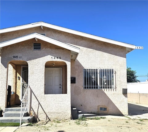 Photo of 1445 W 82nd ST, Los Angeles, CA 90047 (MLS # SB26203801)