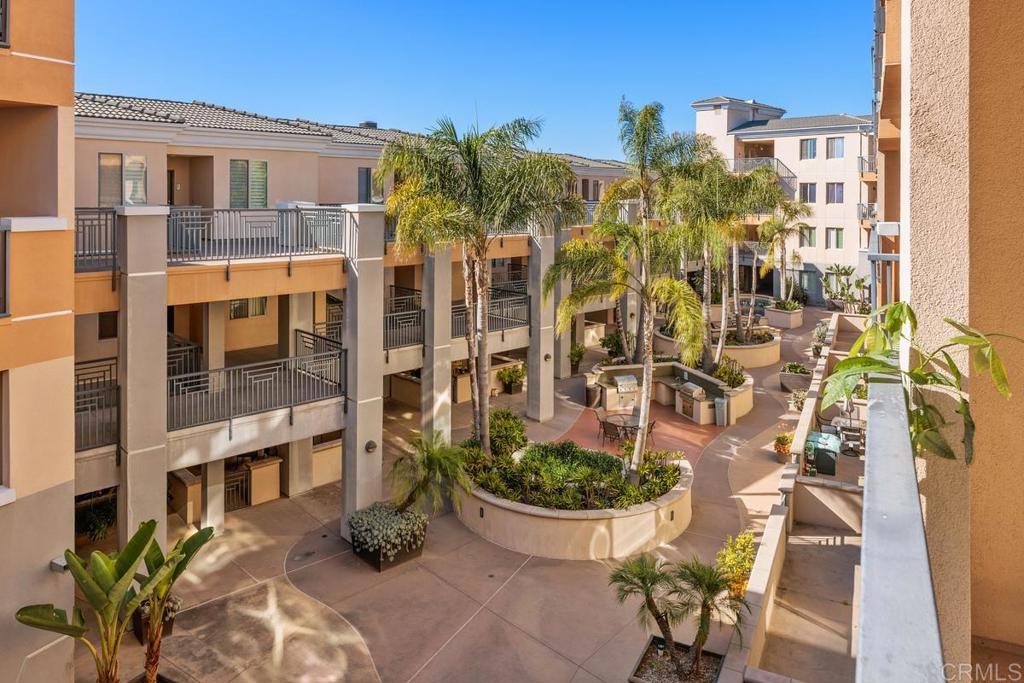 LOCATION! LOCATION! LOCATION! Welcome to this 2BD/2BA home in the HEART of Carmel Valley. This 4th floor unit (the very top floor) in a quiet location is light and bright with an open concept floor plan. The kitchen features slab granite counter tops and backsplash, a brand new cooktop and dishwasher and a stainless steel refrigerator and oven. The HVAC system was replaced a year ago. Additional features include a balcony, full size laundry closet, wood flooring in the entry, kitchen and living room, fresh paint throughout and two underground parking spaces in the garage. Pell Place amenities include a gated entry, elevators in each building, a dog run, fitness room, BBQ area, 18 EV charging stations, and a putting green for residents to enjoy. Located directly across from the Del Mar Highlands Town Center and just steps away from the Carmel Valley Recreation Center, the Carmel Valley Library, and upscale shopping and dining at One Paseo. Award winning school district!