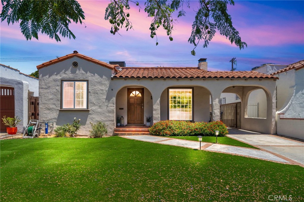 Welcome to 3409 Hollydale Drive, a delightful Spanish-style retreat nestled in the heart of ATWATER VILLAGE. This charming home boasts an inviting curb appeal, enhanced by meticulously maintained artificial turf that complements its timeless architecture. Spanning 1,229 square feet, this residence offers a harmonious blend of elegance and comfort.
As you step inside, you'll be captivated by the living room's enchanting exposed beams, creating a warm and inviting ambiance. The newer flooring throughout the home adds a touch of modern sophistication while preserving its classic charm. The thoughtfully designed layout includes three spacious bedrooms, providing ample space for relaxation and rejuvenation.
The heart of the home, the kitchen, is designed to inspire your culinary adventures. The kitchen features shaker cabinets, stainless steel appliances, quartz counter-tops, and custom backsplash, all helping to provide an elegant look.
The primary ensuite is a sanctuary of comfort, offering a private haven for restful nights. Built-in storage solutions throughout the home ensure that every item has its place, enhancing the uncluttered elegance of the interior. With two tastefully appointed bathrooms, this residence is perfect for accommodating family and guests alike.
Situated on a 5,404 square foot lot, this home offers an ideal blend of indoor and outdoor living. Whether you're entertaining on the patio or enjoying quiet moments in the garden, this property provides a refined lifestyle in one of Los Angeles' most desirable neighborhoods.
Experience the perfect balance of charm and modern convenience at 3409 Hollydale Drive—where your dream home awaits.