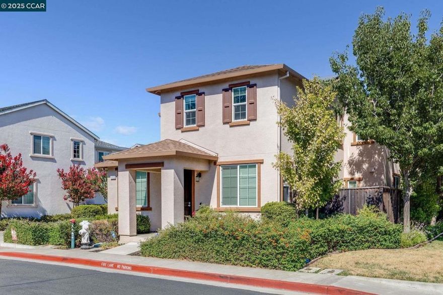 Move-in ready and waiting for you, this stunning 4-bedroom, 3-full-bath home offers modern luxury and comfort. The first floor features updated flooring throughout the living areas. The beautiful kitchen boasts a large granite island, granite countertops, an expansive backsplash, and plenty of cabinet space. It includes an upgraded gas range, microwave, and dishwasher.  Adjacent to the family room, you can step out onto the patio, perfect for outdoor relaxation and entertaining. The first floor also has a convenient bedroom and full bath and access to the garage.  Upstairs, you'll find an extra-large primary bedroom with an en-suite that includes double sinks and a spacious walk-in closet. Two additional bedrooms share a Jack & Jill bathroom. The upstairs laundry room adds extra convenience.This home also features a 2-car attached garage with ample storage, leased solar panels, and a community park. Don’t miss out on making this beautiful home yours today!