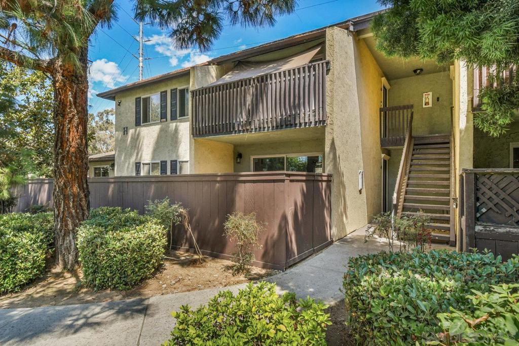 ****This Condo Qualifies for 4 Different Down Payment Assistance/First Time Home Buyer Options*** Welcome to your beautifully refreshed 3-bedroom, 2-bathroom end unit in the heart of Chula Vista! This rare gem offers a spacious living area adorned with crown molding and large dual-pane windows that invite natural light while showcasing enchanting views of lush greenery and towering pine trees. Step into the updated kitchen, featuring stunning granite countertops, spacious cabinets, & stainless steel appliances, including a refrigerator, range, microwave, & dishwasher. The eat-in layout makes it a perfect space for enjoying meals & entertaining guests. Don't miss the in-unit laundry closet!! Unwind in the large primary bedroom, complete with an expansive closet for all your storage needs. The spacious bathroom offers an a vanity area, creating a comfortable & functional retreat. Recent upgrades include brand new luxury plank flooring in the living areas, new carpet in the bedrooms, and fresh interior paint throughout. Enjoy the serene outdoors from your private patio and yard, overlooking a tranquil greenbelt. This condo also includes 2 - one-car detached garage plus an additional designated parking space, (3 total) ensuring ample parking for you & your guests. Residents enjoy access to a sparkling pool, ideal for warm California days, while the HOA covers essential services like water & trash for added convenience. Located just minutes from shopping, dining, & with easy access to the 805 freeway, this home blends comfort, style, and convenience in an unbeatable location.