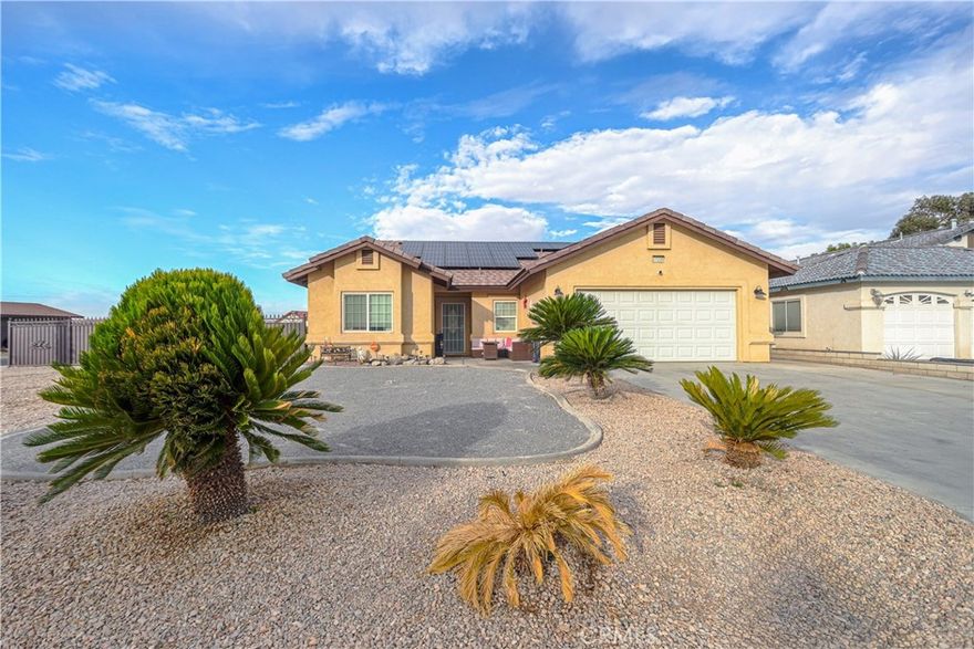 Welcome to 27220 Strawberry Lane in the highly desirable Silver Lakes community! Built in 2007 and situated on a spacious corner lot, this 3-bedroom, 2-bath residence offers  1,934 sq ft of thoughtfully designed living space — the perfect blend of comfort, modern convenience, and resort-style living. Step inside to an open, split-floor plan that ensures privacy and function. The primary suite is generously sized and tucked away from the secondary bedrooms, complete with an oversized bathroom featuring dual sinks, a soaking tub, and a large walk-in closet. Throughout the home, vinyl plank flooring, adding both style and durability. This home is not only stylish — it’s energy efficient and future-ready. A  solar panel system keeps energy bills low, and a Tesla EV charger in the garage makes it easy to power your drive. So schedule a showing today and make this Dream Home your reality!