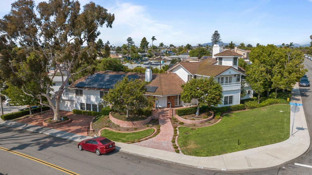 Luxury Living Awaits in Chula Vista’s Premier Neighborhood! Discover a rare opportunity to own a sprawling custom estate in one of Chula Vista’s most prestigious communities—just one block from the Country Club and 3 miles from the exciting new Gaylord Pacific Resort & Convention Center! This is luxury, location, and potential all wrapped into one extraordinary property. With nearly 6,500 sq ft across three expansive levels, this impressive home features 7 spacious bedrooms, 6 full bathrooms, formal living and dining rooms, a large kitchen ideal for entertaining, a recreation room, and multiple cozy gathering spaces. The lower level includes a 2-car tandem garage, family room with fireplace, direct walk-out access to a serene garden retreat, plus a recreation area and separate staff quarters with a private full bath—perfect for guests or multi-generational living. The primary suite is truly next level—an expansive retreat with a luxurious en-suite bath, double-sided fireplace, sitting area, office nook, and a stunning turret den with panoramic views of the bay that will take your breath away. Perfectly positioned near the upcoming Gaylord Pacific Resort, this home is not just a residence—it's an investment in lifestyle and location. You’ll also enjoy quick access to I-5, I-805, and be just 13 miles from San Diego International Airport. Don’t miss this one-of-a-kind opportunity! Call today to schedule your private tour and explore the unmatched potential of this exceptional estate home.