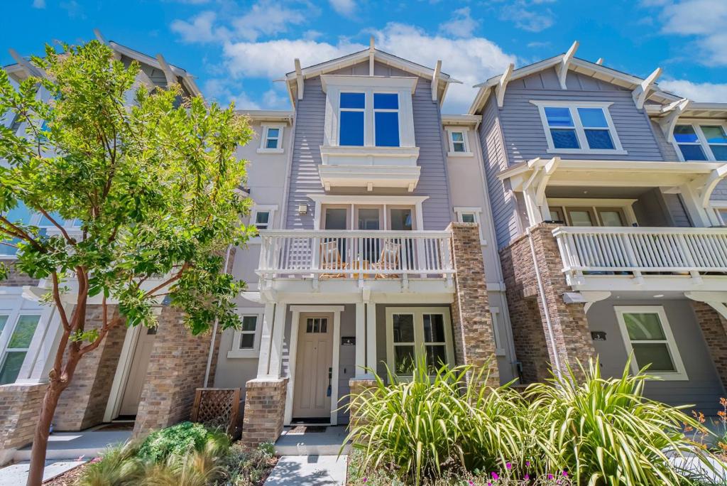 Welcome to this well-maintained 3 bedroom, 2/2 bath townhouse in the desirable community of The Vale. Built across three levels, this home offers a thoughtful layout for daily life. The first floor features a flexible den and a half bath, perfect for a home office, gym, or play area. On the second floor, the open-concept layout connects the kitchen, dining, and living spaces with plenty of natural light. The kitchen includes quartz countertops, stainless steel appliances, a central island, and a walk-in pantry. A big balcony offers a relaxing outdoor spot. Upstairs, the primary suite provides a quiet retreat with a bay window, a customized walk-in closet, and an en-suite bath with dual sinks and modern finishes. Two additional bedrooms share a full bath with a soaking tub. Additional features include a whole-house water softener, multi-zone A/C, tankless water heater, and a two-car side-by-side garage. The community of The Vale offers parks, playgrounds, and a clubhouse. Conveniently located near HWY 101, HWY 237, Lawrence Expressway, Caltrain, and major tech companies, this home combines comfort and convenience in the heart of Silicon Valley. Don't miss this opportunity to make this home your own.