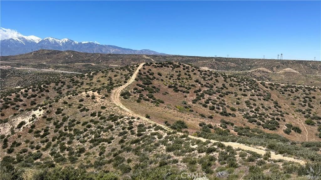 Fantastic chance to acquire 20 acres of luxurious estate living! This exquisite property sits atop a picturesque hill, boasting breathtaking, sweeping vistas of the majestic San Bernardino Mountains and serene Silverwood Lake. Tucked away in the charming Summit Valley, this premier spot presents an ideal canvas to realize your vision of a dream home, offering peaceful countryside living within easy reach of amenities like shopping centers and schools, all while conveniently located less than 15 minutes from the 15 freeway. Contact us now to arrange your exclusive viewing appointment!