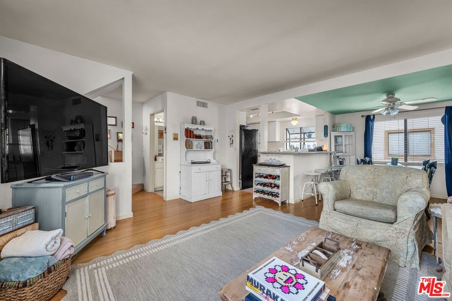 Don't miss out on this fabulous two-story townhome in a quiet and quaint complex in the heart of the San Fernando Valley. This home is move-in ready and just waiting to be called your own. It boasts a desirable open kitchen concept, which overlooks the dining and living room areas, making it perfect for entertaining or being able to keep an eye on the kids, while making dinner. The living room has a wonderful bay window, perfect for curling up with a good book. The bedrooms, which each have their own en-suite bathrooms, are nestled away on the top floor, allowing for maximum privacy, peace and serenity. In addition, this townhome has an attached two-car garage with it's own laundry and direct, secure entry to the unit. The complex also offers a swimming pool and spa for those relaxing summer days and is just minutes from shopping, dining and entertainment. Hurry, as this highly desirable home will not last!