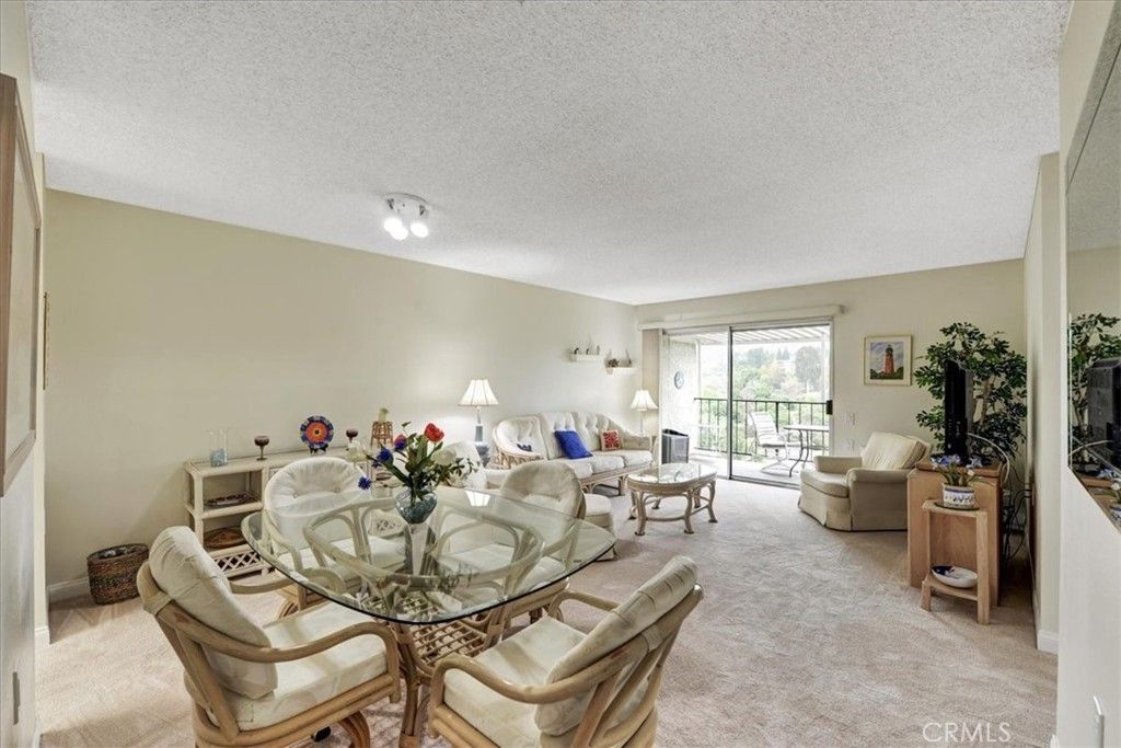 Photo of 3338 Punta Alta #3C, Laguna Woods, CA 92637 (MLS # OC26003641)