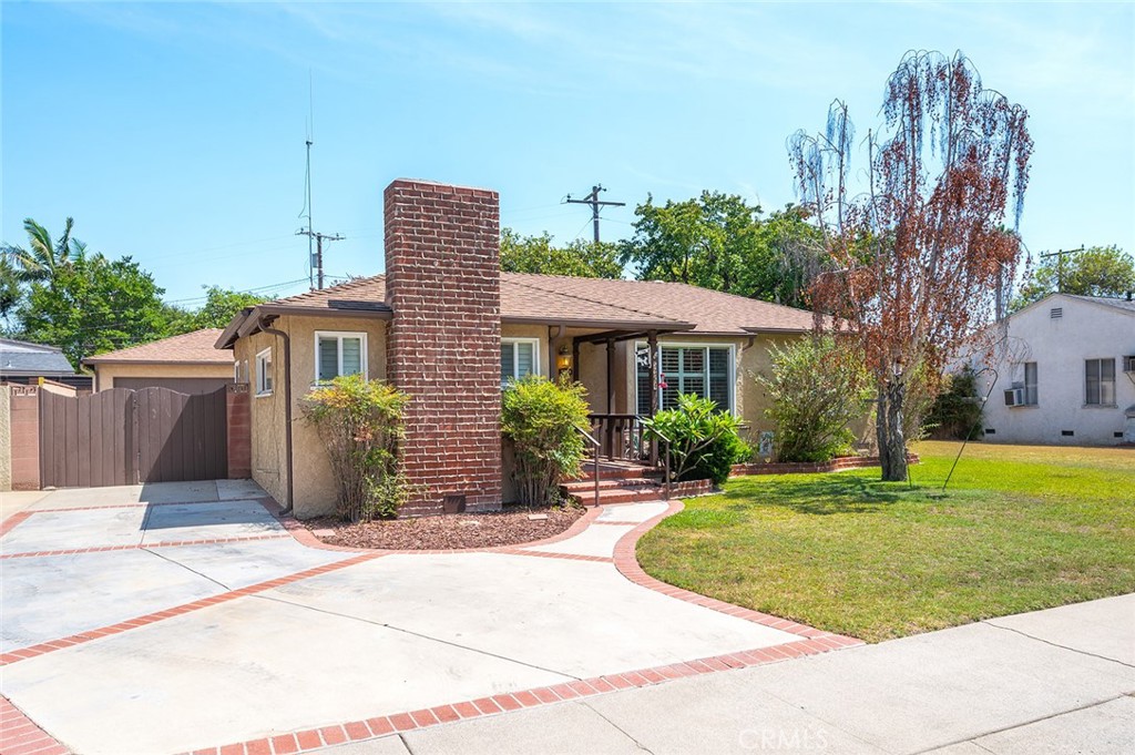 Charming and full of opportunity, this 3-bedroom, 1-bathroom home—with an additional three-quarter bath (permit status unknown)—is situated on a spacious 7,000+ sq ft lot in the highly sought-after Los Altos neighborhood, ideally located south of Stearns. Freshly painted inside, the home features beautiful original hardwood flooring, new laminate flooring in the kitchen, and new carpet in one of the bedrooms, creating a warm and welcoming environment throughout. The thoughtful layout includes a rear-facing kitchen with a peaceful view of the backyard, connecting seamlessly to a cozy dining area. From here, sliding glass doors lead to a covered patio, creating the perfect setting for year-round indoor-outdoor living, dining al fresco, or relaxing in the shade with friends and family. Modern comforts such as forced-air heating and central A/C ensure year-round climate control. The oversized detached two-car garage provides abundant parking and storage, while the fully paid-off solar system offers energy efficiency and reduced utility costs. The enclosed service porch adds a versatile bonus area, and the home’s laundry has been thoughtfully relocated to the garage for added interior space. With its expansive lot, this property offers endless potential—whether you envision expanding the home, adding a pool, designing a lush garden retreat, or adding an ADU! All of this comes in a prime location close to top-rated schools, vibrant shopping and dining, parks, and easy freeway access. This is a wonderful opportunity to own a home in one of Long Beach’s most beloved neighborhoods, where you can create the lifestyle you’ve always imagined.