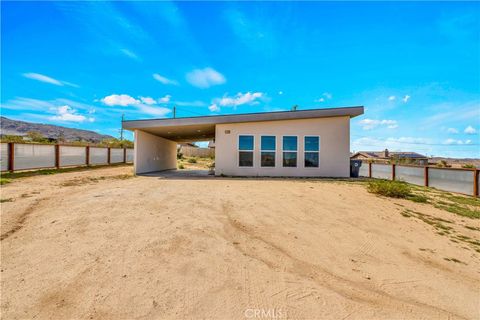 Photo of 7276 Encina Road, Joshua Tree, CA 92252 (MLS # JT26047360)