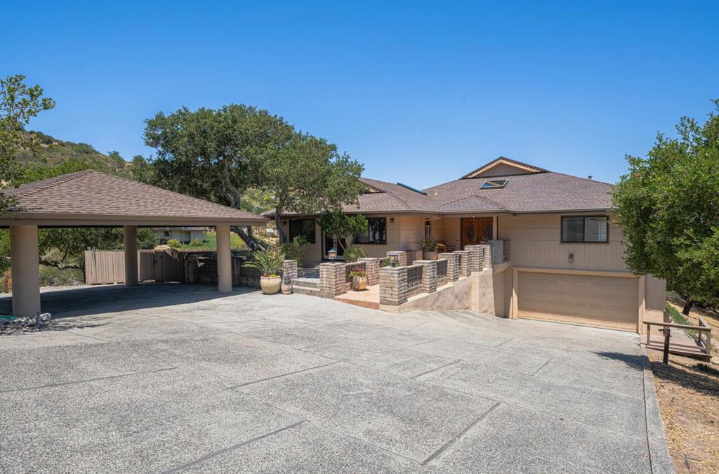 This is the home you have been waiting for. Combined square footage you have 4000+ sf ft home. Incredible value for this meticulously maintained home. Views out of almost every room, feel like your on vacation everyday. Spectacular 3-bed, 2-bath single story home PLUS a 1 bed/bath attached guest or inlaw quarters. Home built in 1984, MAIN house has 3,347 SF, GUEST AREA 739 SF 1-bed, 1-bath in-law unit with private entrance, patio & parking. Built by Nivlac Construction Inc. for the builder himself. Substantially updated main house with chefs kitchen, wood and stone floors, and sweeping views of the San Benancio Hills and beyond from nearly every room. Grand entry opens to a spacious living room, dining area, and family room with beautiful vaulted ceilings, all centered around warmth and comfort with 3 fireplaces throughout. Bonus 450 SF loft, offers flexible use. Primary bedroom has vaulted ceilings with a gorgeous primary bath sanctuary. Multiple patios off the kitchen for effortless indoor-outdoor entertaining. Massive 950 SF garage with workshop area, room for toys, hobbies & storage. Set on 3.5+ acres. Coveted Washington Union School District. Plenty of parking & storage. Homeowners Association for water and roads.