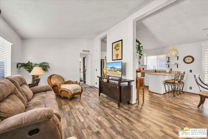 FEE LAND! Welcome to the 55 plus resort style community of Vista Montana! This home is remodeled with a new kitchen with granite counter tops, all new appliances, breakfast bar, new vinly flooring. This home has NO STEPS to access or enter the home, making for easy and convient access.  Both bathrooms have upgraded vanities with granite counter tops and ceramic tile flooring. This home has a 433A permanent foundation which allows for financing this purchase as well. All new blinds and shutter compliment the interior of this beautiful home. There is an extensive concrete driveway over the carport to accomodate 2 plus vehicles and a nice storage shed at the end of the carport. The ameneties in the Vista Montana community are outstanding with a large heated pool and 2 heated spas as well as an additional pool which was recently resurfaced. There is a large clubhouse with large facility to have private parties as well as onsite manager, billiard room, card room, dog park, sauna and exercise room. Come and discover this upgraded home in the community of Vista Montana!  Buyers to verify all MLS information including but not limited to, permits and accuracy of all information prior, through personal inspections with the appropriate professionals to the buyers satisfaction.