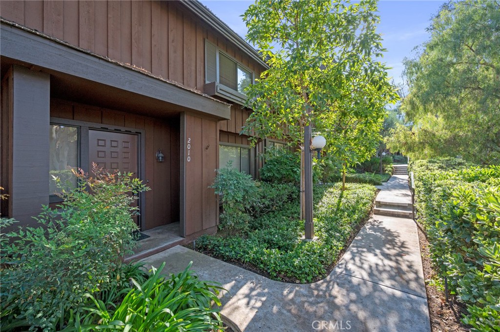 Step into this spacious 3 bedroom, 3 bathroom townhome in the highly sought-after Gardens community. With a well-designed layout, this home provides the perfect balance of comfort and functionality, featuring generous living spaces. All the bedrooms are located upstairs with a large primary ensuite including closet and walk in shower. The private brick patio offers the ideal spot for entertaining guests or a great place to relax. This leads to a 2-car garage with laundry area and plenty of storage space. Living here offers access to fantastic community amenities, including a pool and tennis court—all within the beautifully landscaped grounds of the Gardens. Location is key—this townhome is just a short stroll away from shopping, dining, banking, and more, providing easy access to everything you need. At this price point, you can put your own touch on this unit and make it your own. Come check it out!