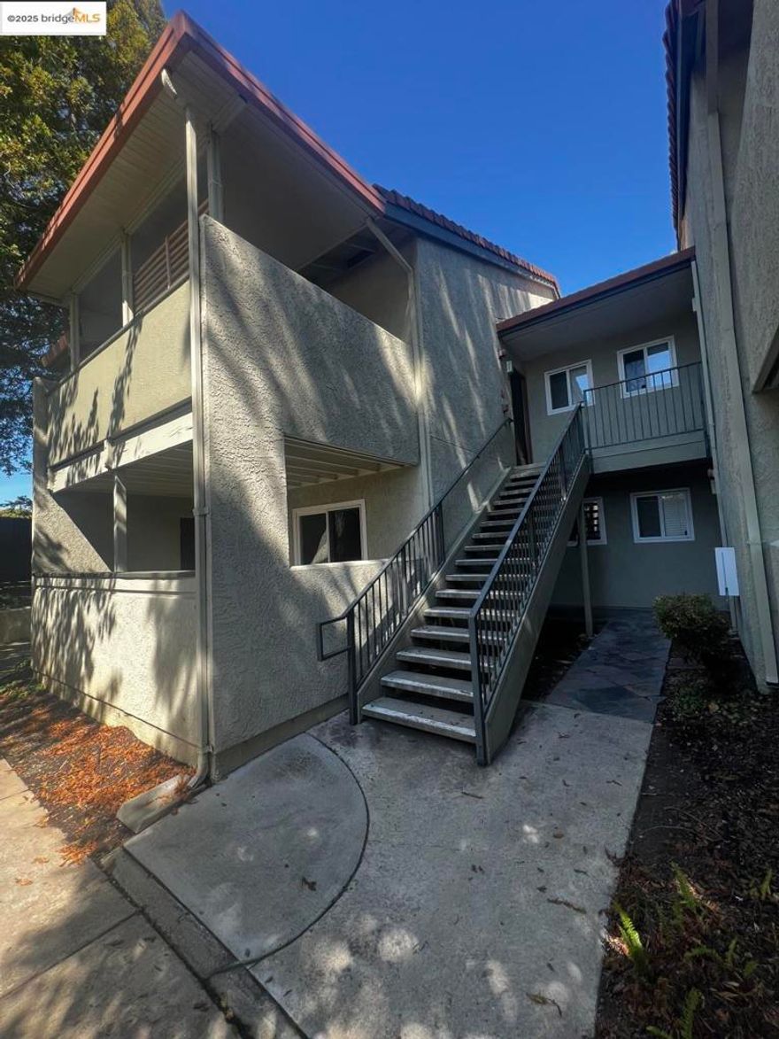 Charming 1BD/1BA ground-floor end unit in the desirable Corners of Concord community! Enjoy step-free entry, added privacy, and easy access to community amenities. Features include a cozy living room, a dedicated dining area, dual-pane windows, recessed lighting in the kitchen, and quartz countertops. In-unit laundry adds everyday convenience. Recently updated with new interior paint, new bedroom carpet, and new HVAC - this home is move-in ready! Relax outdoors on the covered patio just off the living area. A perfect blend of comfort, style, and functionality!