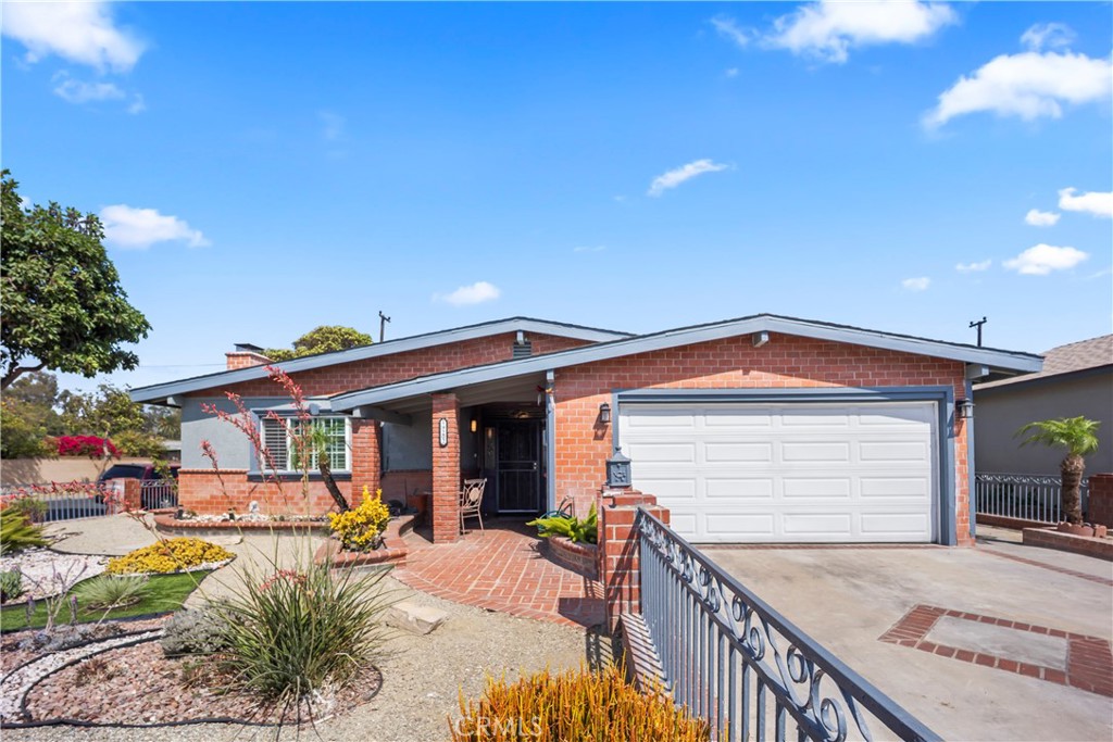 Welcome to this exceptional six-bedroom, three-bathroom ranch-style residence, located in one of the most desirable neighborhoods of Carson. Situated on a premium corner lot, this home stands out with its tasteful brick façade and timeless curb appeal. Inside, you’ll find a thoughtfully designed layout with both a separate living room and family room, offering flexibility for entertaining and everyday living. The galley-style kitchen is a highlight, showcasing sleek granite countertops, stainless steel appliances, and a warm, inviting atmosphere. Recessed lighting throughout adds a modern touch and enhances the home’s bright, open feel.
The primary suite is a true retreat, featuring an impressive bathroom complete with a walk-in shower and a spacious jacuzzi tub, designed to provide the perfect place to relax and unwind. An added bonus to this home is the rear section, which can easily be utilized as an ADU. Whether you envision a private in-law’s quarters, comfortable space for visiting guests, or an additional rental opportunity, this flexible option enhances both lifestyle and value.
Perfectly positioned, the property is centrally located near California State University Dominguez Hills, local schools, parks, shopping, and a variety of transportation options, ensuring convenience at every turn. This rare offering combines space, style, and versatility in a sought-after Carson location.