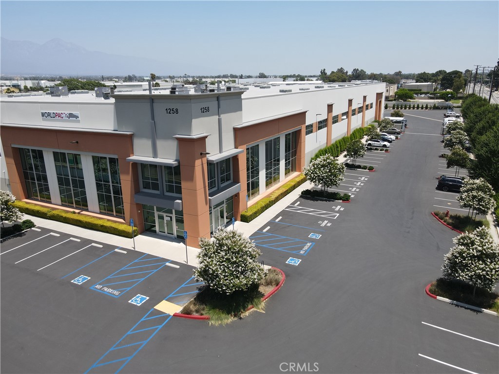 High profile freestanding industrial building on 3.4 acres - 11,607 SF of two story office - Warehouse office with restrooms - 32' clear height - Built in 2017 - ESFR sprinklers w/ K-25 heads - 5 DH doors - 2 GH doors - Secured Truck Court - 1.2 miles to 60 freeway via Reservoir St