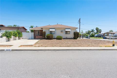Photo of 10243 Saratoga Avenue, Montclair, CA 91763 (MLS # AR26168109)