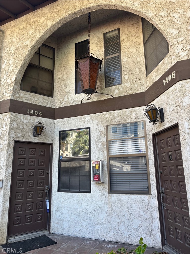 Great location near the college. Two-story condo with two bedrooms, one full bathroom upstairs, and a powder room downstairs. There is a two-car detached garage. The unit has been freshly painted. Wooden floors and tile kitchen. Includes a refrigerator, washer, and dryer for the tenants to use.