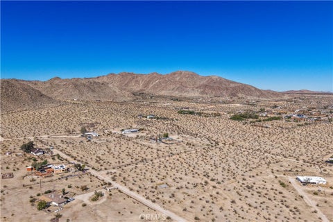 Photo of 61830 Highland Drive, Joshua Tree, CA 92252 (MLS # JT26209134)