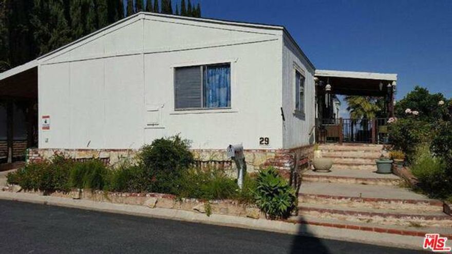 Welcome home to the desirable gated "Summit" community in a very scenic and tranquil setting, nestled up in the mountains in West Hills. Great Price for this Manufactured Home that has great potential with some refreshing, and is located on Clubhouse Drive, just walking distance to Pool and Clubhouse, has 2 bedrooms and 2 baths and a Den, with approx.1446 square feet. Capture the view from the living room and from Large covered porch to enjoy the beautiful California weather and view. The carport provides plenty of space to park your vehicle and store your extra belongings in the storage shed. This community is family and pet friendly, having great amenities such as a community pool, spa, tennis court, and a clubhouse to host your family and friends. RV parking at premises, if available.