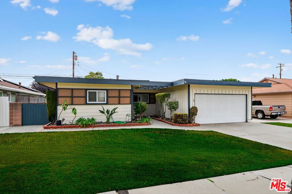 Step into this mid-century style home, nestled on a quiet, tree-lined street in the sought after El Dorado South/ Plaza neighborhood. Boasting 4 bedrooms and 2 bathrooms and a sparkling private pool, this refreshing sanctuary offers gorgeous hardwood parquet floors, fresh paint, crown molding and ceiling fans. The kitchen offers a bright, open layout with white cabinetry, tile countertops, stainless appliances and washer/ dryer. Each bathroom has been thoughtfully remodeled, one with floor to ceiling tile and travertine flooring and the other with a custom walk-in shower.