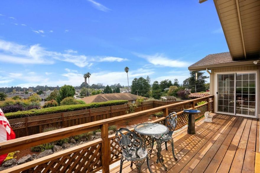 Welcome to your new home in the charming community of Aptos. This delightful residence offers a spacious 1,890 sq ft of living space, featuring three bedrooms and two full bathrooms, all conveniently located in this single level home. The kitchen and dining area provide a wonderful area for culinary experiences. The ocean and sunset views add to the feeling of a light and bright environment. The home features a blend of carpet, laminate, and tile flooring, providing a mix of comfort and easy maintenance. Enjoy cozy evenings by the fireplace, adding warmth and ambiance to your living space. For your convenience, the laundry area is equipped with a washer and dryer and is located in the utility room. Additional amenities include solar power, supporting energy efficiency. The property is situated within the Pajaro Valley Unified School District. With a generous lot size of 11,587 sq ft and a two-car garage, this home offers ample space for all your needs. Don't miss this opportunity to settle into a comfortable and well-appointed home in Aptos - close to shopping, restaurants, Aptos library, the freeway and Nisene Marks park.