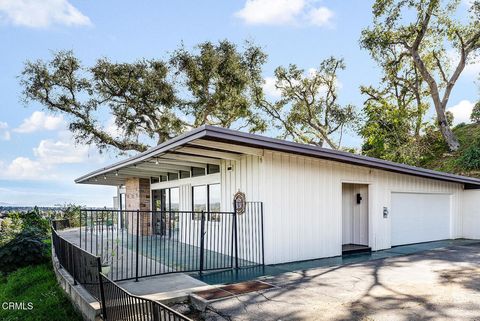 Photo of 877 Hillcrest Drive, Pomona, CA 91768 (MLS # P1-25855)