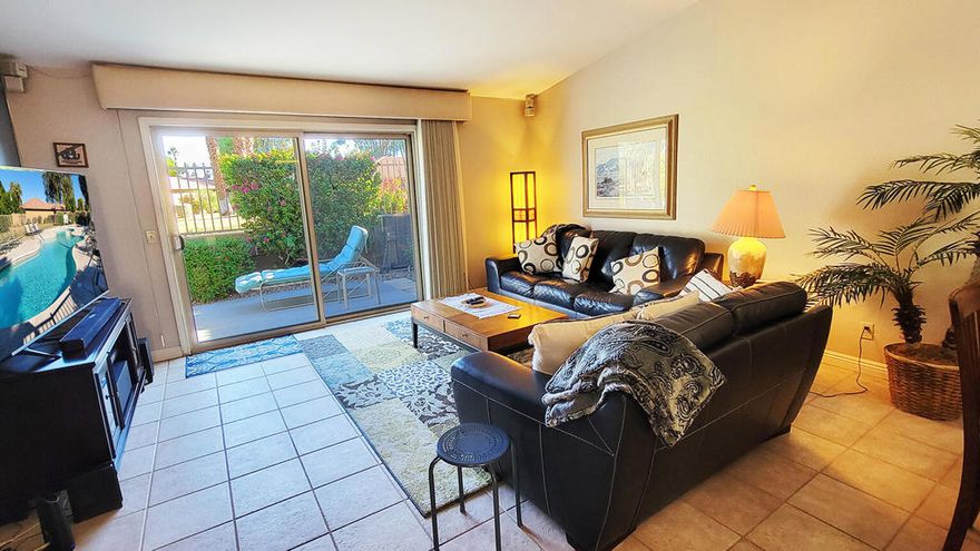 This is the one you have been waiting for! Your Desert Oasisawaits in this beautifully updated and well maintained 2-bedroom, 2-bath turnkey end-unit condo in the exquisite Indian PalmsCountry Club.  Rest easy knowing your condo has beenthoughtfully updated with a remodeled primary shower withhandicap bar, a new water heater(2025) and newer HVACsystem. The unit was also recently re-roofed and painted andwindows were replaced with top of the line Milgard windows.Enjoy a front patio with outdoor entertainment bar andbarbecue. This is a desired location in the HOA as your backpatio offers the sounds of a relaxing waterfall and and lakeview from your enclosed patio. Enjoy watching the birds withearly morning coffee and lunch in the afternoon shade. Thehome offers a garage and parking for two vehicles on. With your purchase of 82088 Cochran, you haveexclusive deeded access to the Indian Palms Lifestyle Center.New memberships are currently sold out - but with your deed- you are guaranteed a spot in the membership-onlyclubhouse. The Lifestyle Center offers water aerobics, yogaand stretch classes, bocce ball leagues, pickleball and tennis.In addition, HOA-14 maintains all of your landscaping andprovides access to 2 local pools. Indian Palms Country Clubfeatures a 27-hole championship golf course and is locatedminutes from the world-famous Empire Polo Grounds. Cometake a tour and experience the stunning resort lifestyleawaiting you. Don't miss your chance to own a piece ofparadise -- where everyday feels like a vacation!