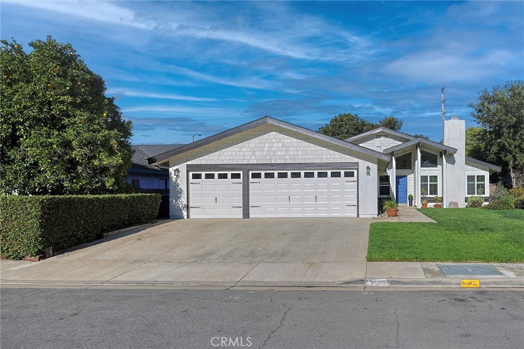 Welcome to this beautifully updated family home, nestled in the highly desirable community of Newbury Park. Offering over 1,700 square feet of bright, open-concept living space, this residence blends comfort, style, and functionality—perfect for modern family living. Step inside to find soaring ceilings, rich wood flooring, and a cozy fireplace that creates a warm and inviting atmosphere. Fresh custom paint and elegant window shutters enhance the home's contemporary charm, while tile and plush carpet add texture and comfort throughout. The spacious kitchen is a chef’s dream, featuring abundant cabinetry, upgraded countertops and backsplash, state-of-the-art appliances, and a charming garden window that floods the space with natural light. Each bedroom is generously sized, complete with walk-in closets and new carpeting. All bathrooms have been thoughtfully remodeled with top-tier materials and designer finishes, providing a spa-like experience in the comfort of your own home. Additional highlights include a three-car garage and a recently refreshed landscape—perfect for outdoor gatherings and weekend entertaining. Enjoy the best of Newbury Park living in this move-in-ready gem, ideally suited for families seeking space, style, and a sought-after neighborhood.