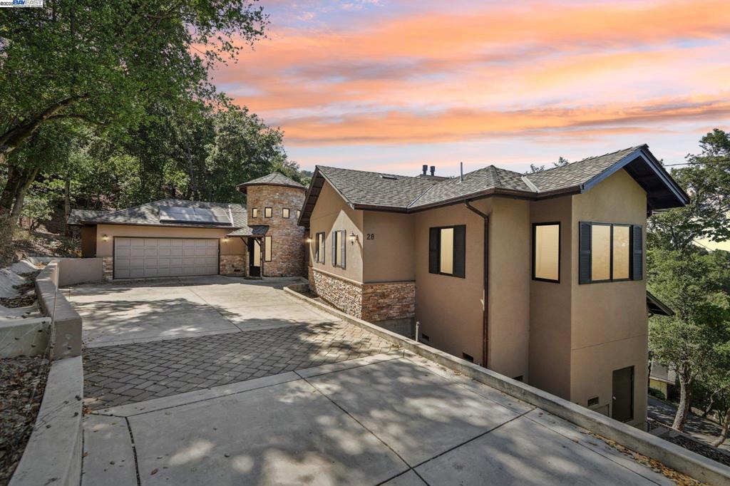 Stunning executive newer built home with breathtaking views and uncompromising attention to detail. This home showcases the finest craftsmanship, modern luxury and owned solar. Nestled on nearly one acre in a coveted grand-view parcel- this property offers serene water views from both levels and a seamless indoor-outdoor lifestyle. Step inside to soaring ceilings and an open-concept layout flooded with natural light. Rich hardwood flooring runs throughout the home, setting the tone for elegant living. The chef’s kitchen is a showstopper, featuring top-of-the-line Thermador appliances, sleek finishes, and ample space for entertaining. The spacious primary suite is conveniently located on the main level, while the lower level offers a potential in-law suite, along with a generous second living area complete with a wet bar and an expandable wine cellar—perfect for hosting guests or relaxing in style. French doors on both floors open to expansive decks, blending the beauty of outdoor living with indoor comfort. Enjoy peaceful mornings, sunset evenings, and year-round entertaining in this private retreat. Close proximity to top-rated schools, quick access to BART and a short commute to San Francisco. A rare blend of luxury, location, and lifestyle—don’t miss this opportunity.