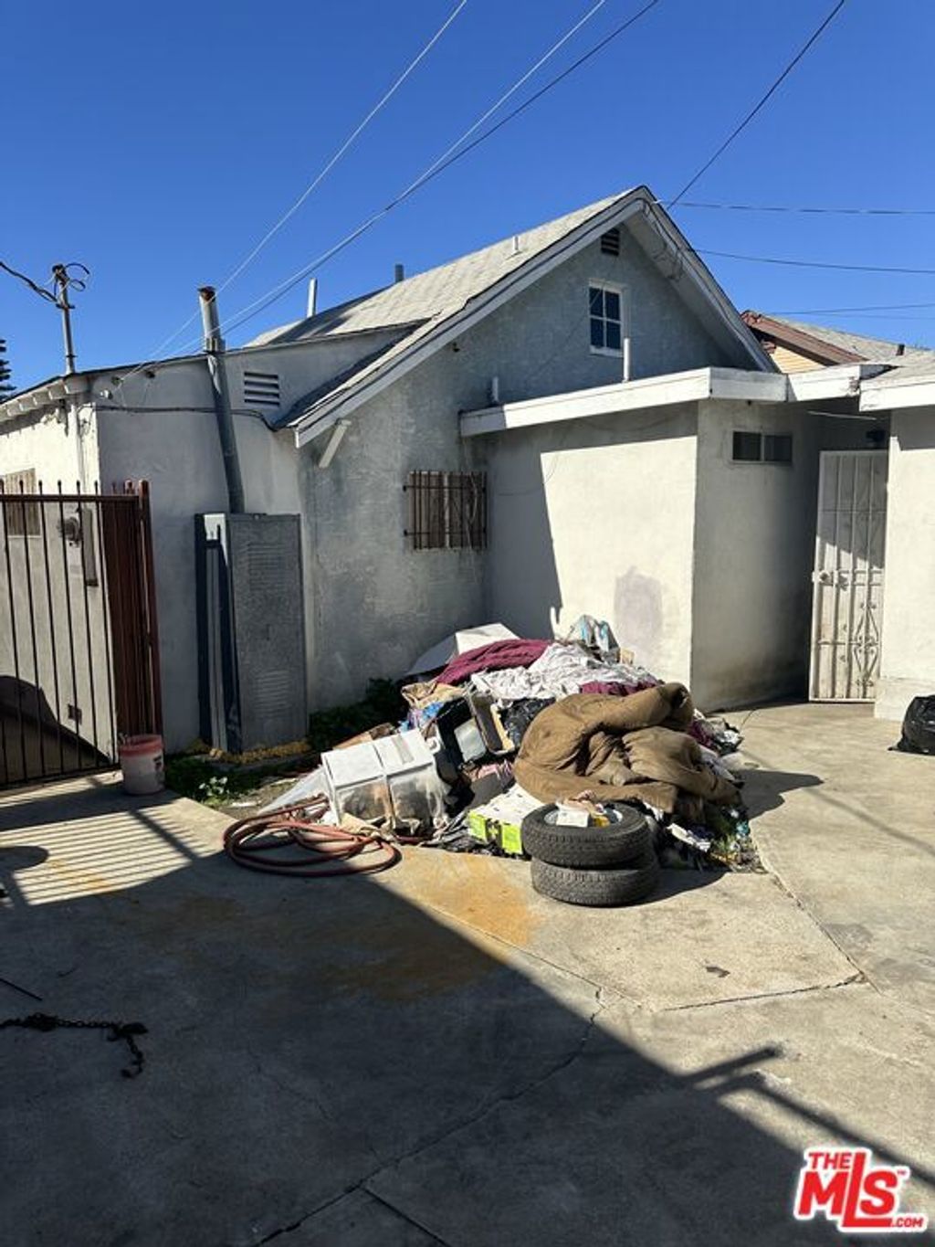 Photo of 7316 10th Avenue, Los Angeles, CA 90043 (MLS # 25624369)