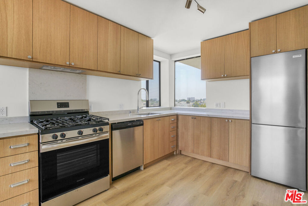 Discover elevated urban living in Westwood's newest modern apartment community. Perfectly tailored for professionals, students, and families, this brand-new construction 16 unit complex blends modern style with comfort and functionality. Be the first resident! Apartment 503 is rear-facing and is one of the most desirable units in the property. It features a 2 bedroom/2 bathroom open concept layout and is equipped with new stainless steel appliances, in-unit laundry, and central air and heat. Perhaps its most alluring quality, however, is the early morning light the rises over the panoramic city views - a wonderful setting to wake up to. Enjoy the ease of secure underground parking and working remotely from the rooftop deck. 1822 Overland is centrally located to major employment, freeways, and points of interest alike. Residents will enjoy the short 1.5 mile or less proximity to the UCLA campus, Century City Mall, the 405 freeway, and the upcoming Metro Purple Line extension stops at Wilshire/Gayley and Constellation/Avenue of the Stars. Don't miss this opportunity your new luxury lifestyle awaits!