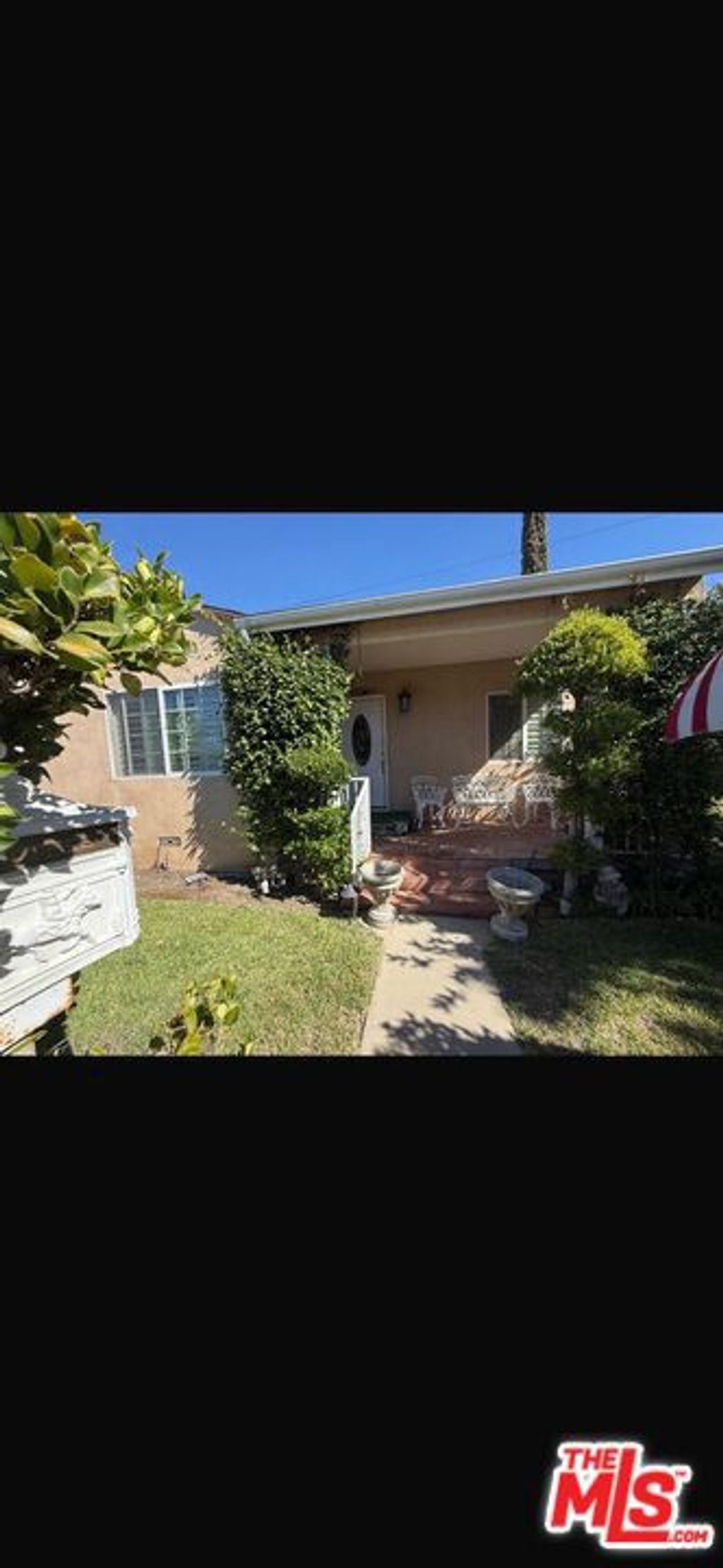Photo of 10322 Rincon Avenue, Pacoima, CA 91331 (MLS # 25579093)