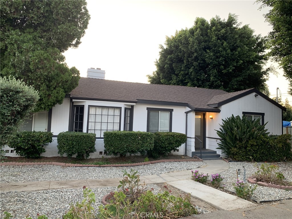 Seize this incredible opportunity to own an attractive single-story home with two additional dwelling units (ADUs) in the back! The updated main house boasts 2 bedrooms, 2 bathrooms, newer roof, and 1,444 sq ft of modern living space. The larger ADU features 2 bedrooms and 2 bathrooms, while the junior ADU offers 1 bedroom and 1 bathroom, both beautifully remodeled with newer kitchens and bathrooms. Each unit enjoys a yard and dedicated parking, making this property a perfect blend of comfort, style, and income potential.