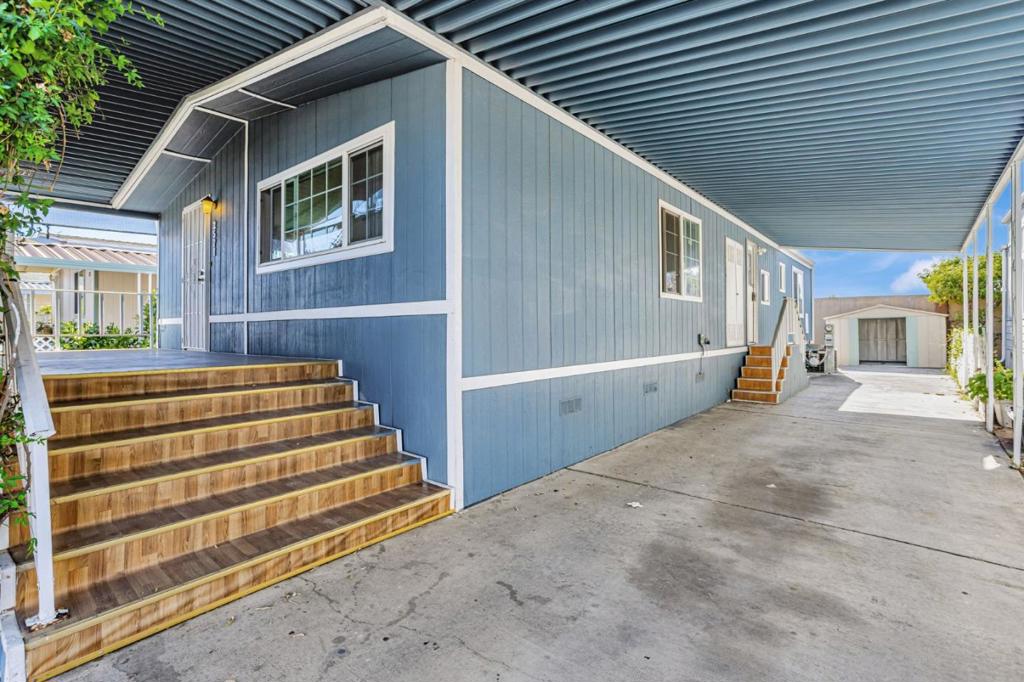 Welcome to Whispering Hills Mobile Home Parkfeaturing low space rent of just $897/month. This light-filled 2-bed, 2-bath home offers a spacious great-room layout for living/dining, a refreshed kitchen with newer cabinets and granite countertops, and a large primary suite. The primary bath includes a newer shower with sliding glass door and full-height tile, plus bonus storage. A long covered front patio invites outdoor lounging, and the extra-long driveway parks up to three full-size cars. Central AC keeps you comfortable on hot days. Family-friendly park amenities include a pool and well-kept grounds. Fantastic, walkable location near Costco, banks, dining, and shopping. Flexible floor plan with potential to create an additional room (buyer to verify). A clean, convenient lifestyle in a desirable communitydont miss it!