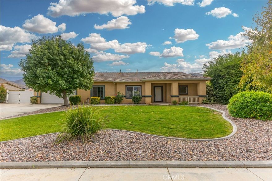 Hi there, are you one of those people who keep missing out on getting into one of these almost half acre properties in Banning? Well here's your chance, don't miss it this time... Welcome to 1454 Bryan St, located in the beautiful Fair Oaks Ranch community on the south side of Banning at the foothills of the San Jacinto mountains. Come and enjoy no HOA, LOW taxes, and the freedom to spread out and LIVE!!! Featuring 4 bedrooms, 2 baths, and sitting in 2378 sqft, this home is thoughtfully laid out, bright, airy and very spacious. As you pull up, the first thing you'll notice is the mature trees and beautiful landscaping. Be sure to take note of the oversized driveway, double gates and RV parking on the left. When you enter, the tiled hallway opens up to a massive family/dining room with fireplace, from where you can relax and enjoy the stunning mountain views. This space is overlooked by your well appointed, beautiful kitchen with tons of storage, ample work surface and quartz countertops. The oversized primary bedroom has a large bathroom with jetted tub, separate shower, walk-in closet and takes up the entire west wing of the home, and has a slider door that takes you out to your covered patio. Another welcoming feature is that the primary suite is completely separated from the other good sized secondary rooms, and all rooms have ceiling fans and enjoy stunning views. The backyard is an entertainers delight, with more than enough room to add a pool (an infinity pool would be amazing!!!) The entire home has been freshly painted inside, so just move on it and start writing your next chapter of your life, I promise you'll be glad you did!!!